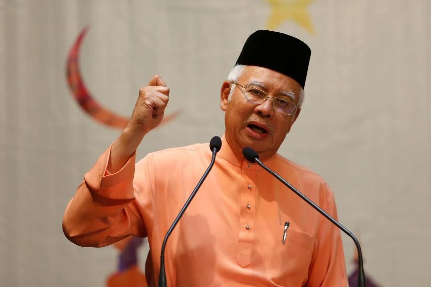 Police searched Najib Razak’s home for more than six hours, looking for documents in connection with the 1MDB multibillion-dollar corruption inquiry. (Reuters)