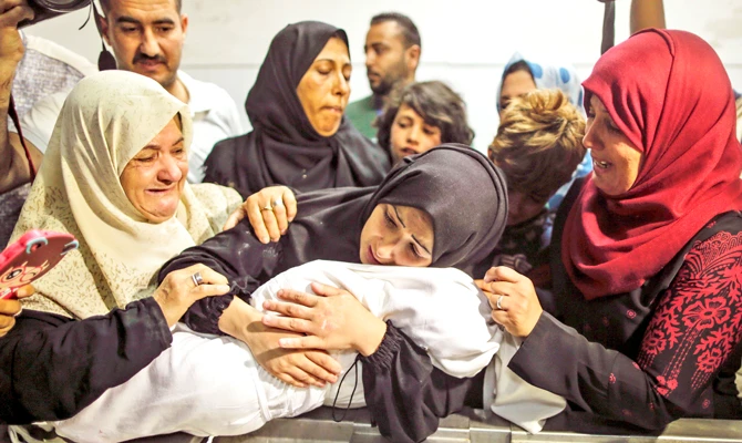 Opinion in Gaza divided over protest deaths