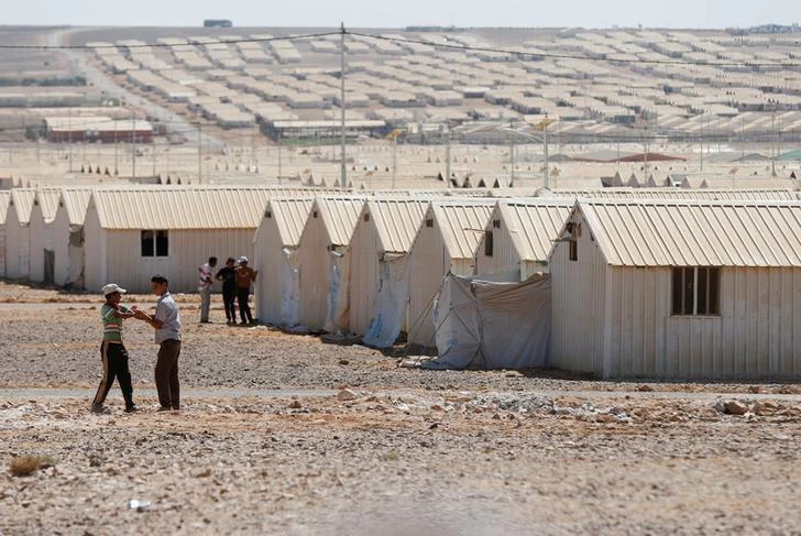 Syrian refugee children play at Azraq refugee camp for Syrians displaced by conflict, in Jordan. (Reuters)