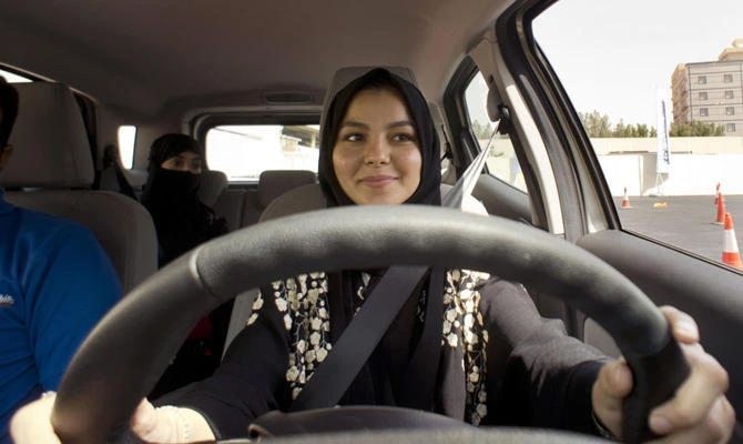 A student at the women-only campus of Effat University sits for the first time in the driver’s seat during training sponsored by Ford Motor in Jeddah, Saudi Arabia. (AP)