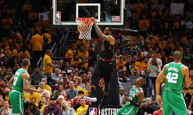 LeBron James of the Cleveland Cavaliers dunks the ball in the second half against the Boston Celtics during Game Three of the 2018 NBA Eastern Conference Finals at Quicken Loans Arena on May 19, 2018 in Cleveland, Ohio. (Gregory Shamus/Getty Images/AFP)