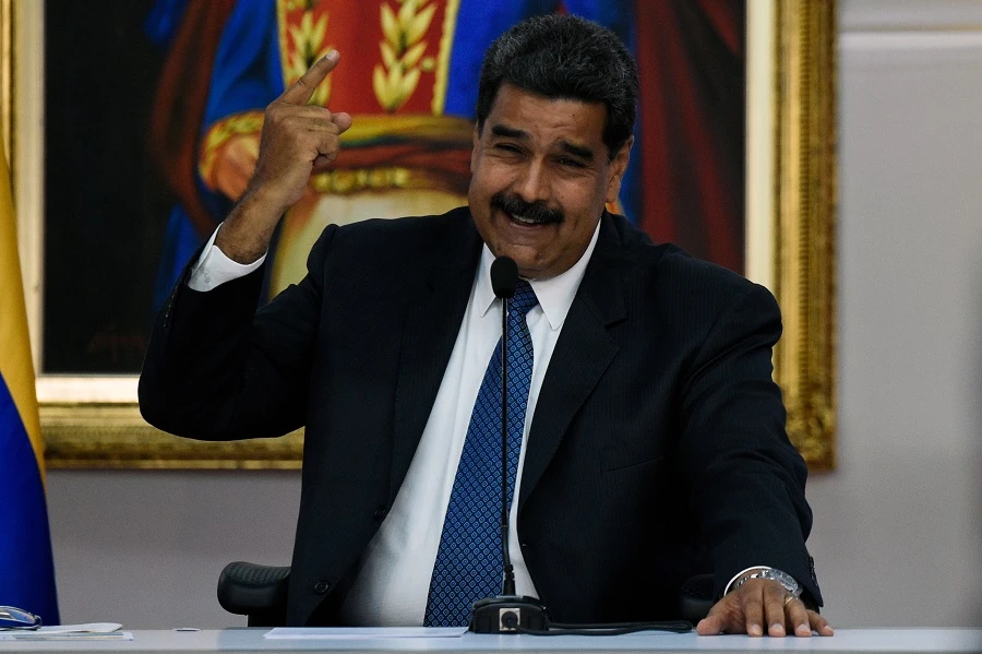 Venezuelan President Nicolas Maduro, gestures during a meeting with the international observers for the upcoming May 20 election, at the Miraflores presidential palace in Caracas on May 18, 2018. (AFP)