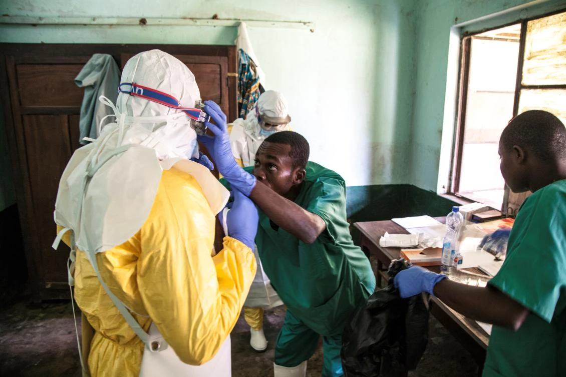 In this handout photograph released by UNICEF on May 13, 2018, health workers wear protective equipment as they prepare to attend to suspected Ebola patients at Bikoro Hospital - the epicenter of the latest Ebola outbreak in the Democratic Republic of Congo (Mark Natalin/UNICEF/AFP)