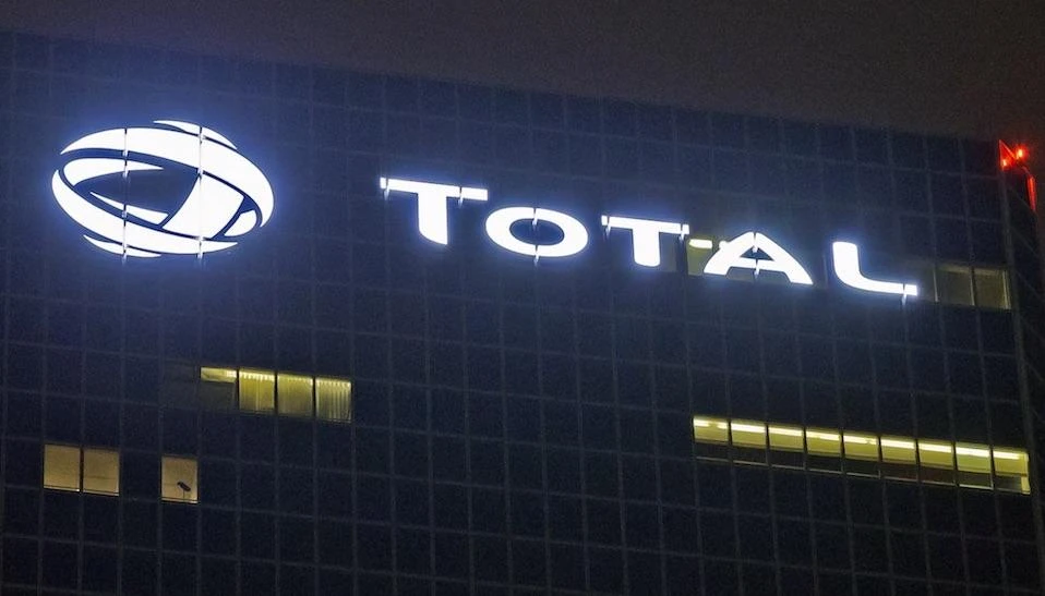 In this file photo taken on Oct.12, 2016, the logo of French oil giant Total SA is pictured at company headquarters in La Defense business district, outside Paris. (AP/Michel Euler)