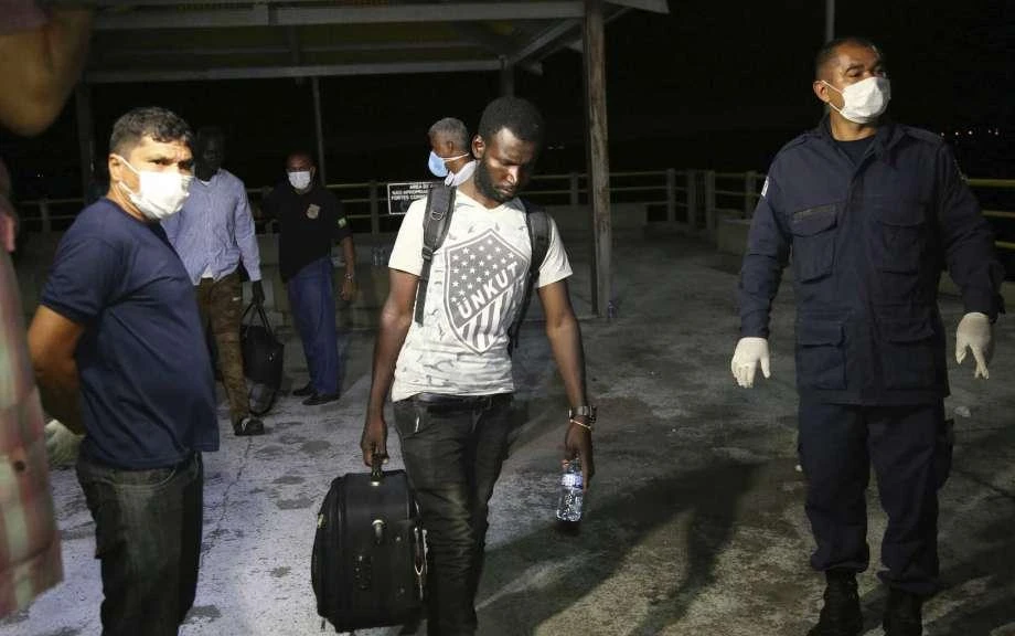 An African migrant arrives in Sao Jose de Ribamar, Brazil. Two dozen African migrants came ashore in the northeast of the country after being rescued at sea by fishermen. (AP Photo)