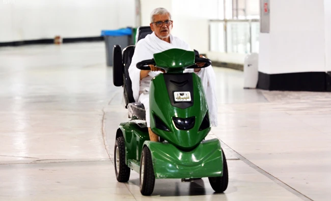 Pilgrims use electric cars in Grand Mosque in Makkah