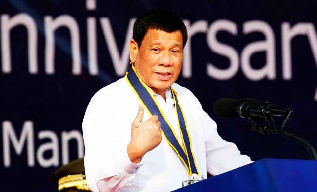 Philippine President Rodrigo Duterte addresses troops during the 120th anniversary of the Philippine Navy, on Tuesday, May 22, 2018 in suburban Pasay city south of Manila, Philippines. (AP)