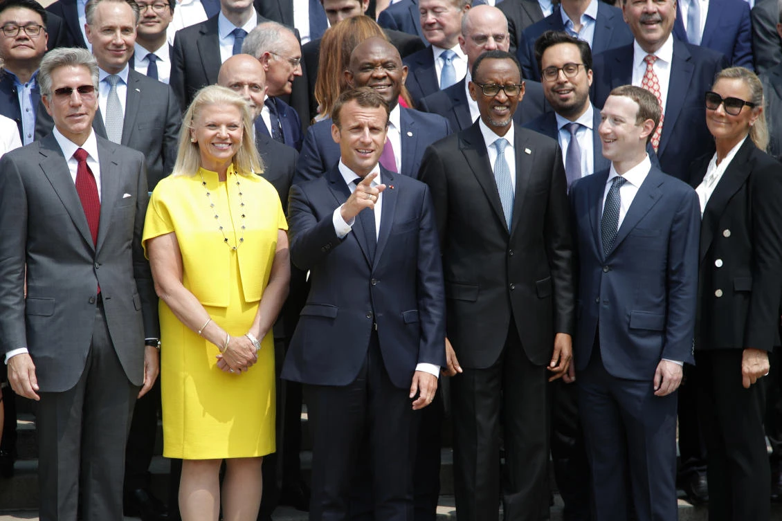 French President Emmanuel Macron, center, poses for a family picture with Rwanda’s President Paul Kagame, Facebook’s founder and CEO Mark Zuckerberg and IMB’s President and CEO Virginia Rometty as he hosts the “Tech for Good” summit over lunch with tech companies CEOs at the Elysee Palace in Paris, France. (AP)