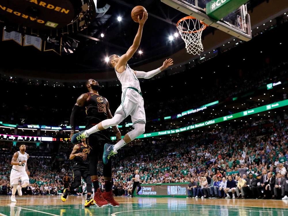 Boston Celtics forward Jayson Tatum attempts a layup in front of Cleveland Cavaliers forward LeBron James during the third quarter of game five of the Eastern conference finals of the 2018 NBA Playoffs at TD Garden. (Greg M. Cooper-USA TODAY Sports)