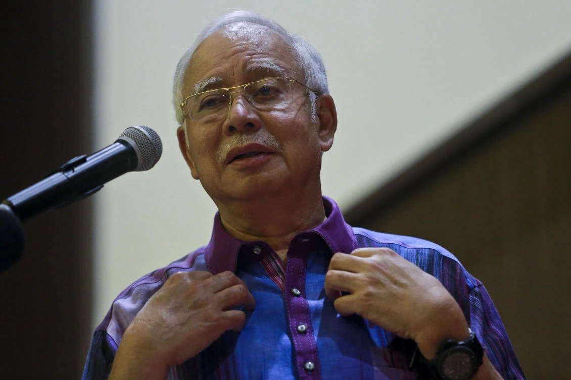 Former Malaysian Prime Minister Najib Razak gestures during his speech at United Malays National Organization (UMNO) building in Pekan, Malaysia, Sunday, May 20, 2018. (AP)