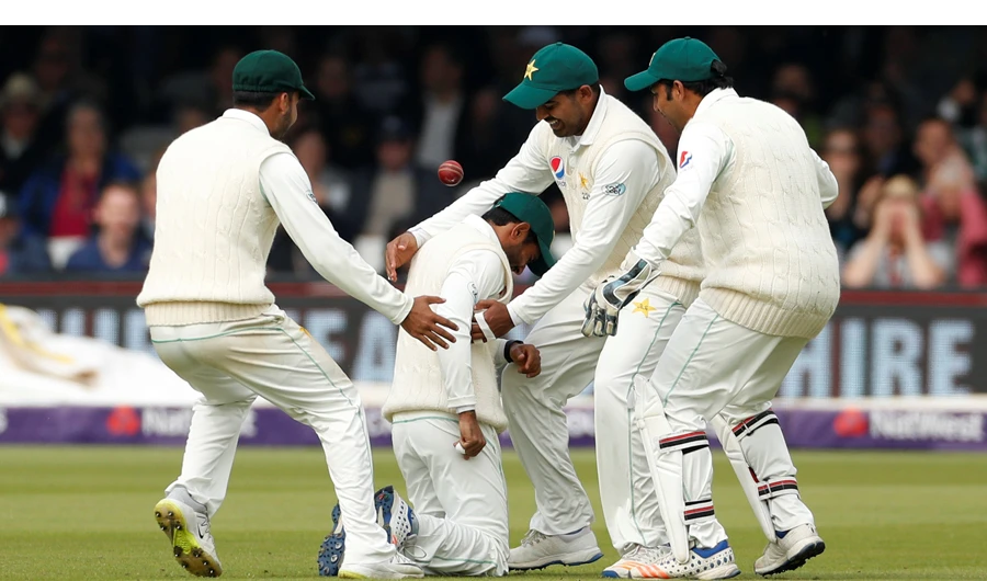 Pakistan’s Asad Shafiq celebrates after catching out England’s Jos Buttler during the first Test against England at Lord’s Cricket Ground, London, Britain. (Action Images via Reuters)