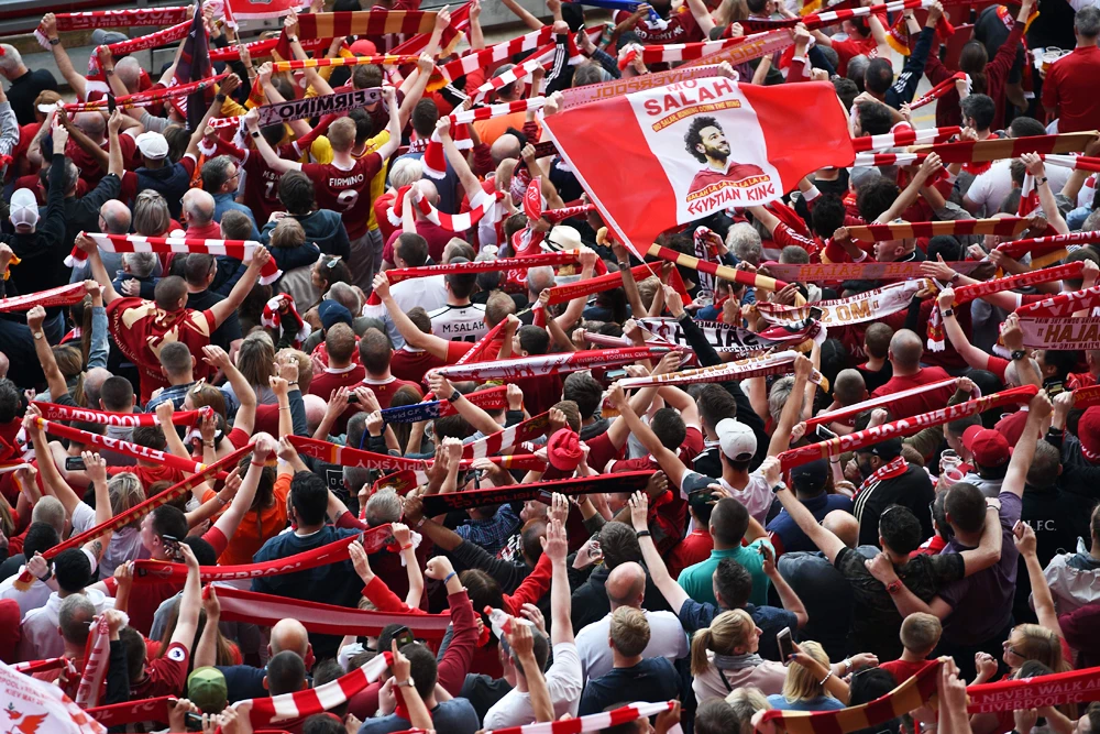 Liverpool fans watch a large screen in Anfield stadium in Liverpool, northern England on May 26, 2018 showing the UEFA Champions League final football match between Liverpool and Real Madrid in Kiev. (AFP / OLI SCARFF)