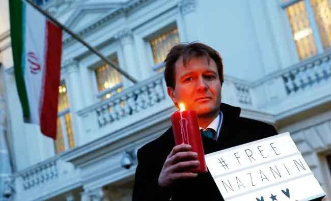 In this file photo dated on Jan. 16, 2017, Richard Ratcliffe husband of imprisoned charity worker Nazanin Zaghari-Ratcliffe, poses for the media during an Amnesty International led vigil outside the Iranian Embassy in London. (AP)