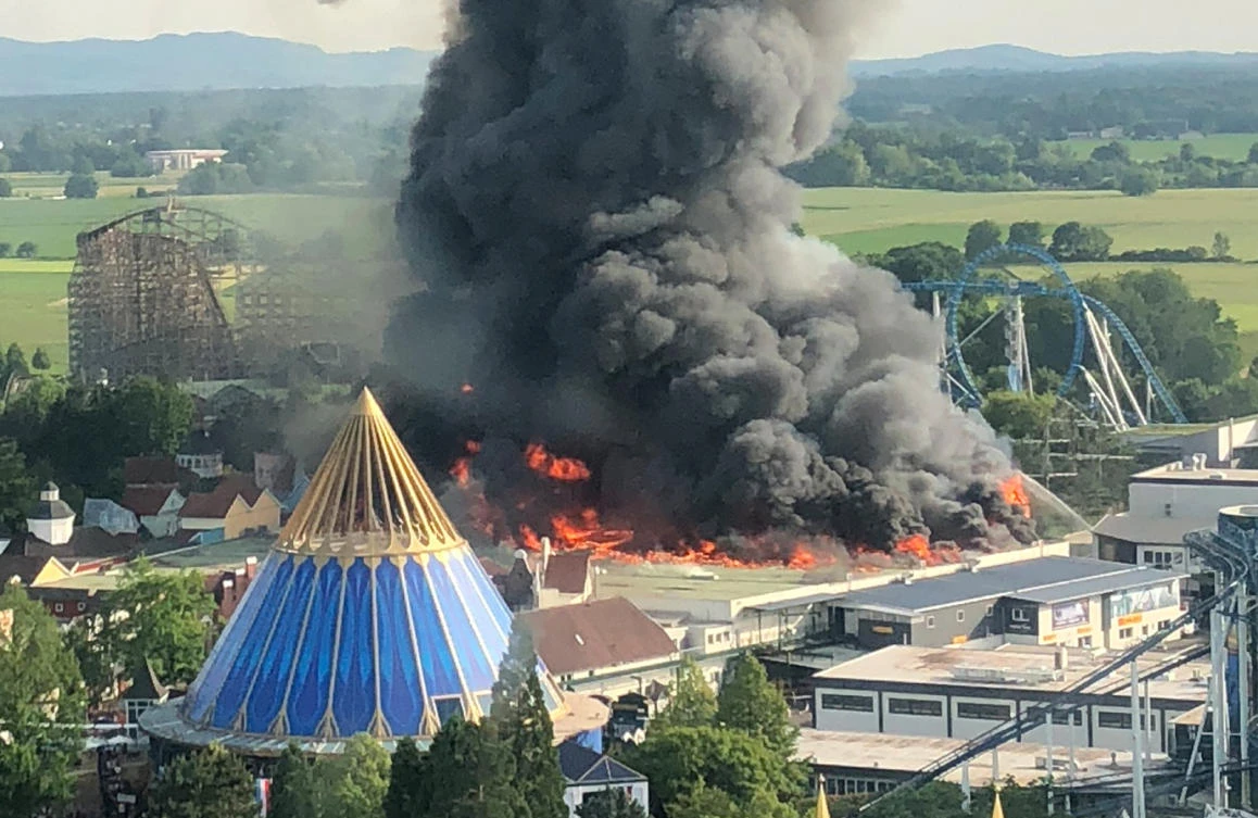 A black column of smoke rises from a warehouse in flames above the amusement park ‘Europapark’ in Rust, southern Germany on May 26, 2018. (AFP)