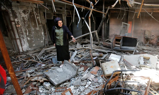 Raghad Hammadi, who is a member of a group of students campaigning to help rebuild the Central Library of Mosul University, speaks with Reuters, in Mosul, Iraq on May 14, 2018. (REUTERS/Khalid Al-Mousily)