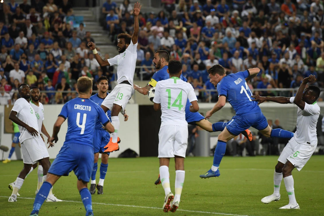 Italy's Andrea Belotti, right, scores his side's second goal during a friendly soccer match between Saudi Arabia and Italy, at Kybunpark Stadium, in St. Gallen, Switzerland. (Gian Ehrenzeller/ Keystone via AP)