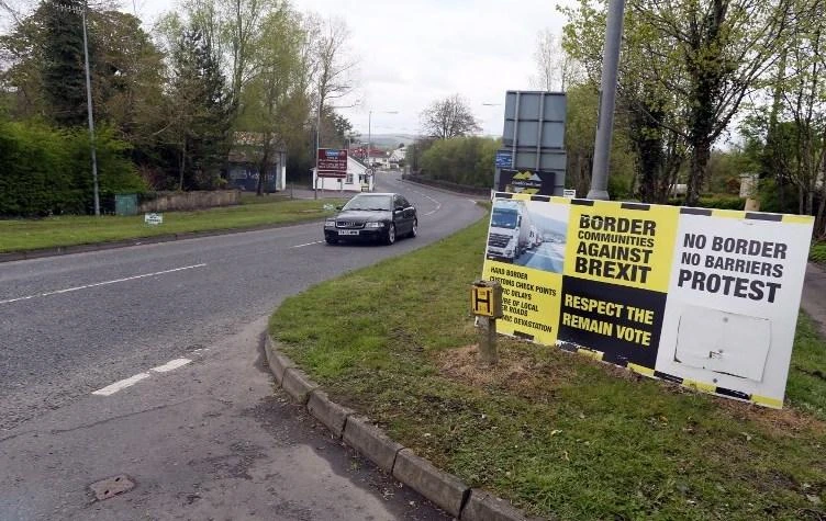 Above, Brexit posters are pictured at the border crossing at Muff in Co Donegal near Lough Foyle, on the border with Northern Ireland and Donegal in the Republic of Ireland in this April 2017 photo. (AFP)