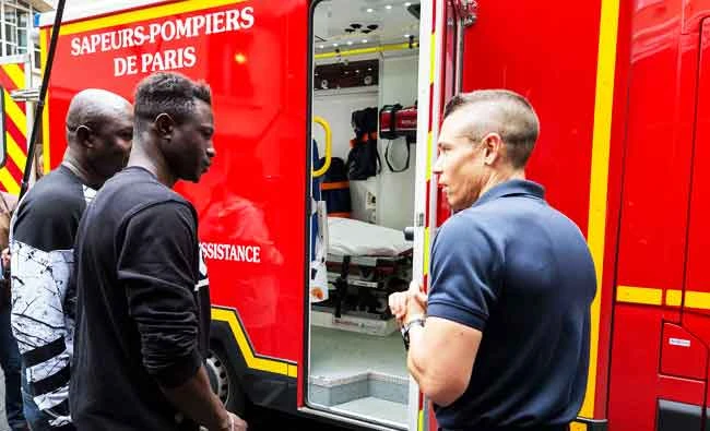 France’s ‘Spiderman’ joins fire brigade as citizenship awaits