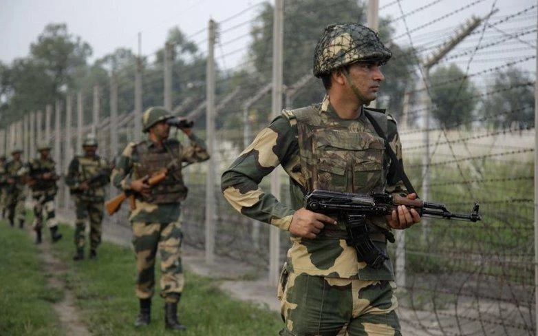 Soldiers patrol near the Indian-Pakistani border area about 48 kilometers from Jammu, India. (AP)