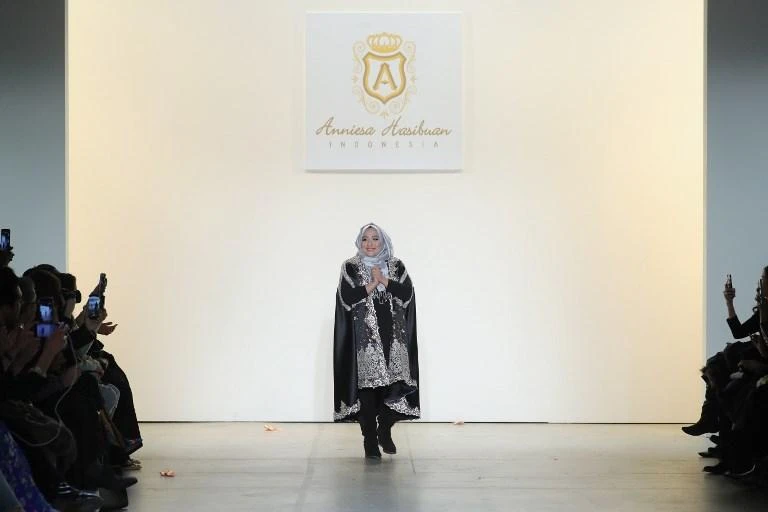 Indonesia’s leading Muslim fashion designer jailed for fraud