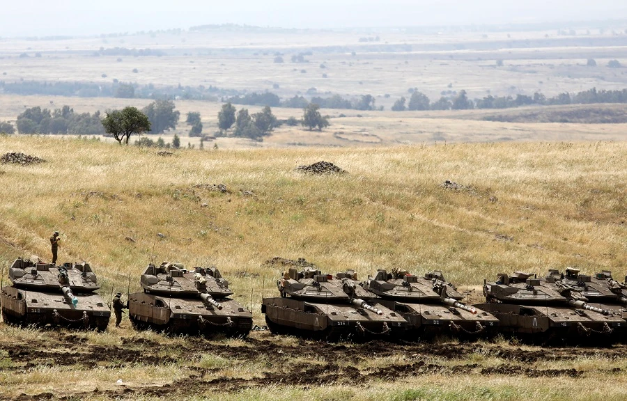 Israeli Merkava tanks are seen in a deployment area near the Syrian border in the Israel-annexed Golan Heights on May 10, 2018. (AFP)