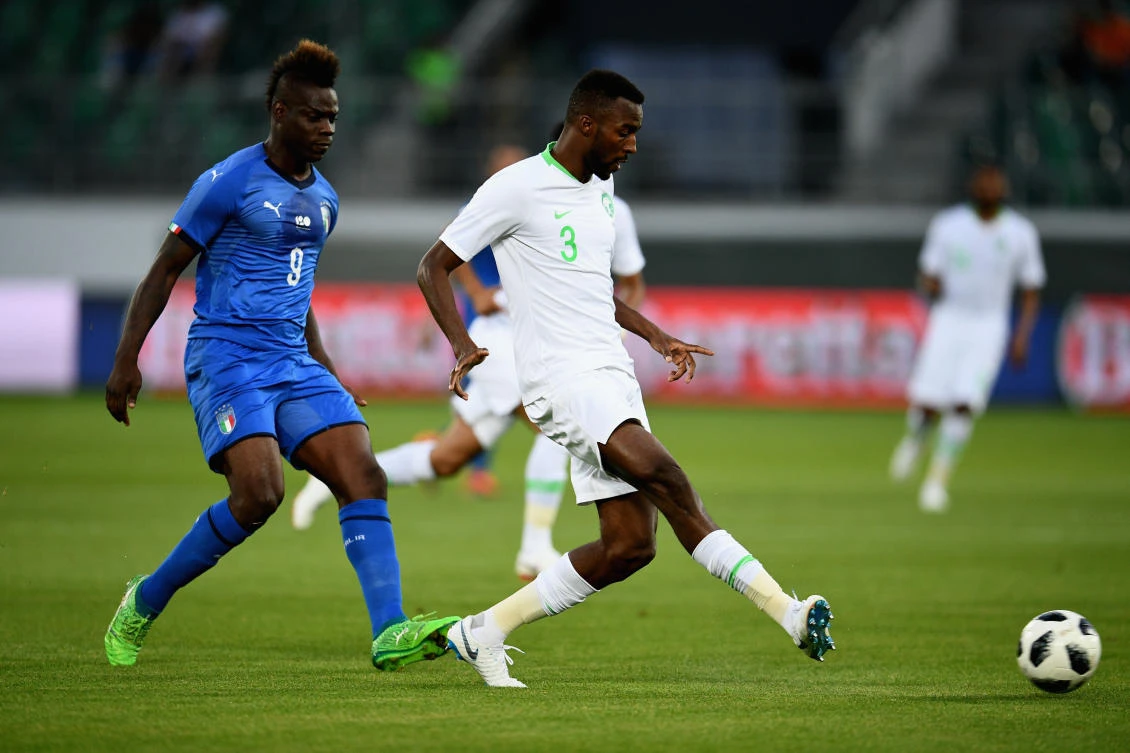 Osama Hawsawi got a taste of what the World Cup would be like when he came up against top forward Mario Balotelli on Monday. (Getty Images)