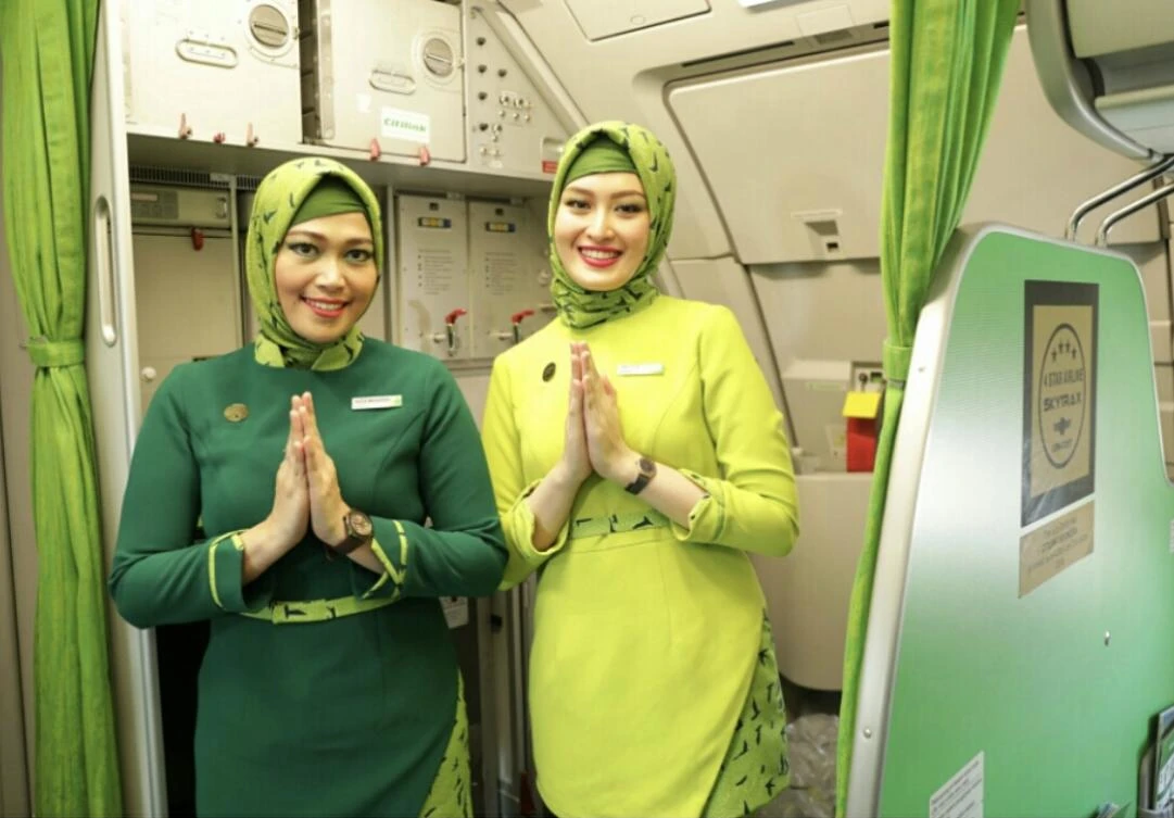 Women flight attendants on Indonesia’s low-cost Citilink airline wear uniforms featuring a headscarf design. (Citilink Indonesia)
