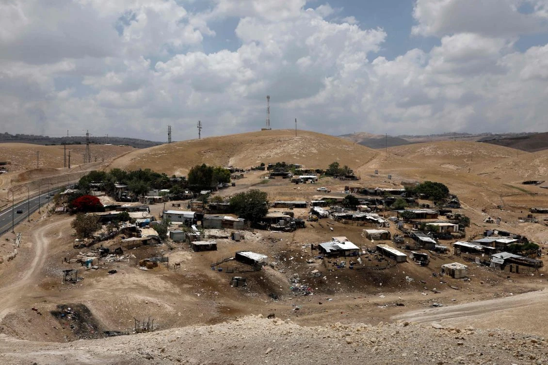 Khan Al-Ahmar Bedouin village, located between the West Bank city of Jericho and Jerusalem, near the Israeli settlement of Ma'ale Adumim, is scheduled for demolition. (AFP)