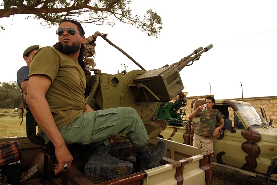 Libyan forces, loyal to Libyan strongman Khalifa Haftar, gather near the coastal city of Derna. (AFP)