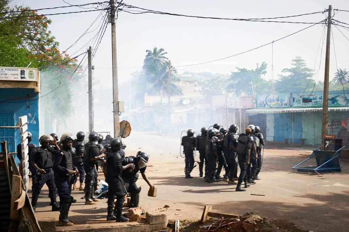 Malian anti-riot police officers arrive to control a demonstration against the lack of transparency of the presidential election’s campaign, on June 2, 2018 in Bamako. (AFP)