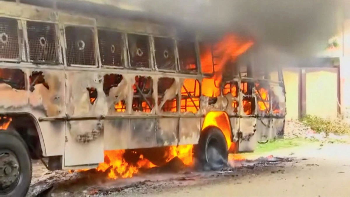 A bus on fire is seen during a protest against the construction of a copper smelter by Vedanta Resources, in Thoothukudi, Tamil Nadu, India (Reuters)