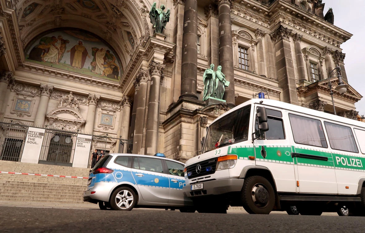 Police vehicles at the Berliner Dom after a German policeman shot a man at the Berlin Cathedral, German media reported in Berlin, Germany, June 3, 2018. (Reuters)
