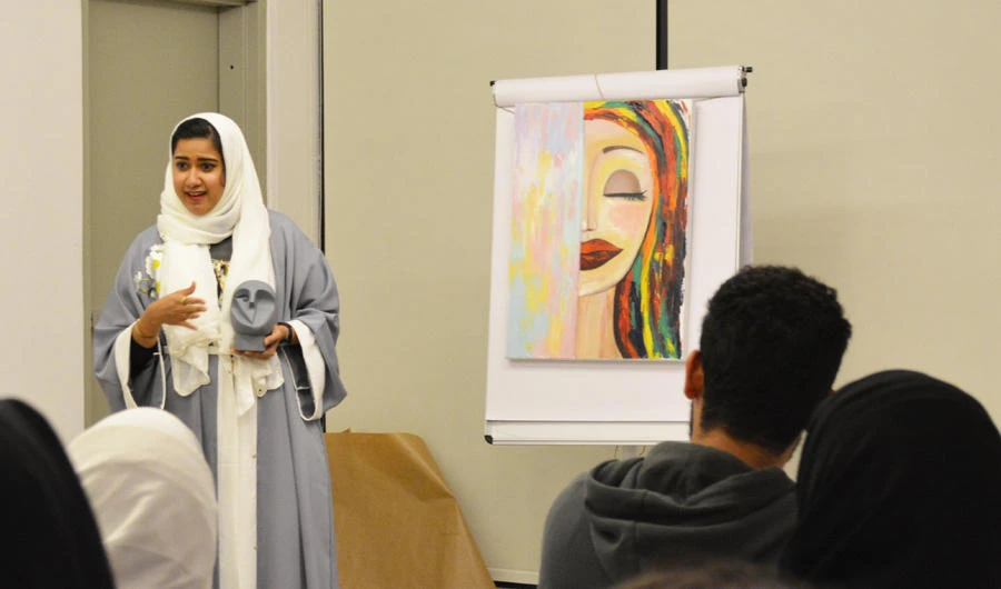 A participant renders a poem during the event. (AN photo)