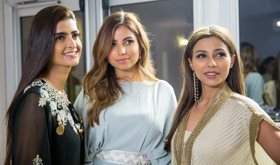 Nadine Attar, center, posing with Mahira Abdelaziz from MBC, right, and TV personality Ola Al Farsi at the official launch.
