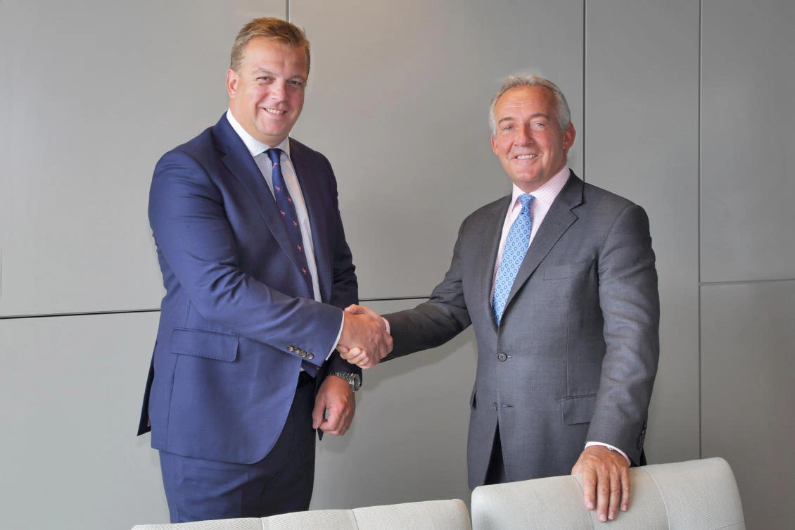 Cluttons Chief Executive Steve Morgan (left) with Mark Ridley, Savills deputy group chief executive. (Courtesy of Cluttons)