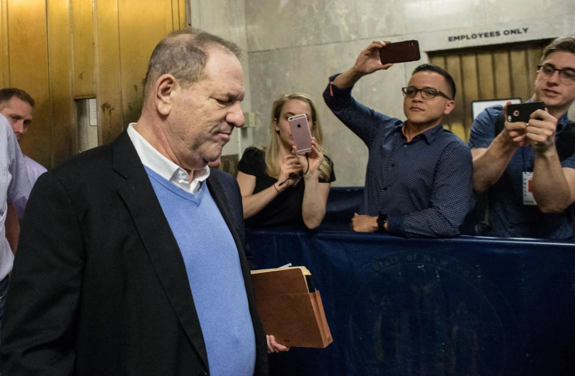 Harvey Weinstein leaves the Manhattan Criminal Court in New York after being charged with rape and a sex crime on May 25. Salma Hayek, Gwyneth Paltrow and Angelina Jolie are among more than two dozen actresses who say they were sexually harassed by the producer. (AFP)