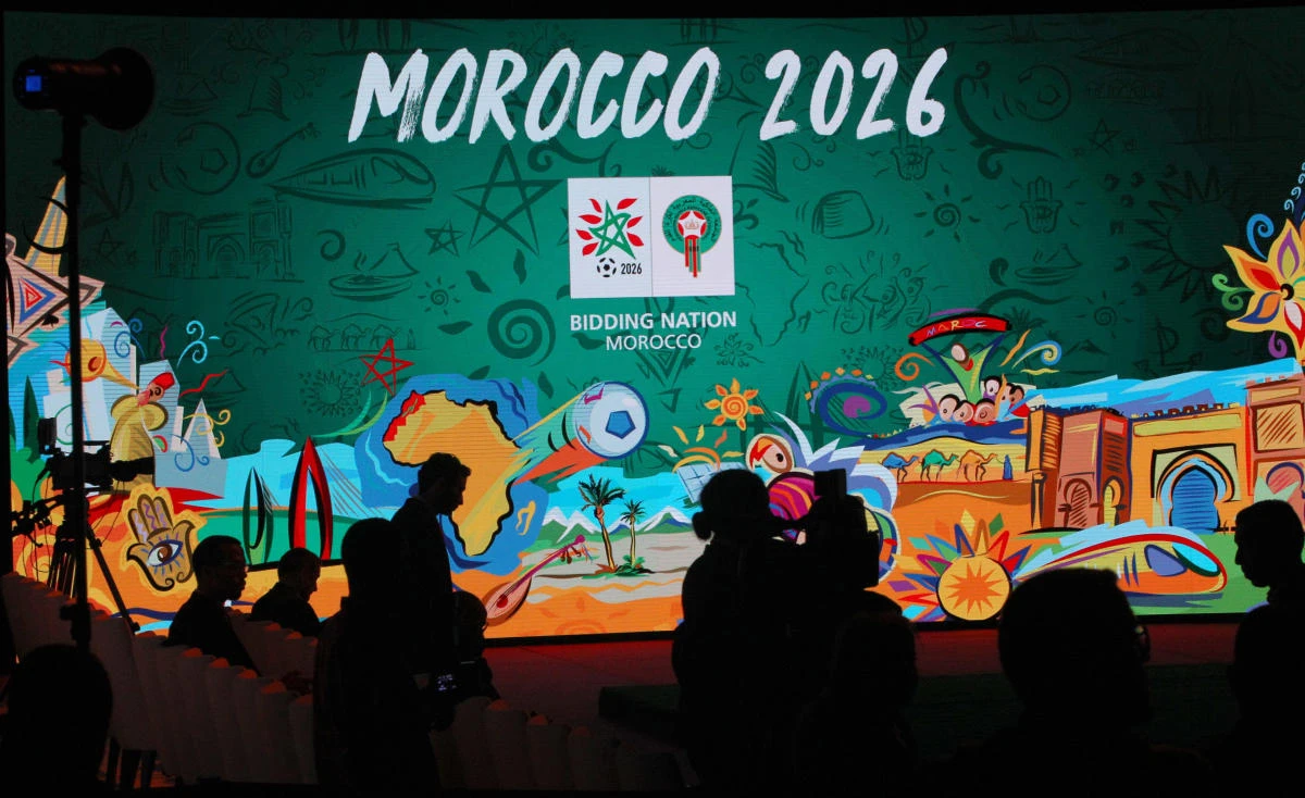 A giant screen display the logo of Morocco 2026 inside of the reception before a press conference to promote Morocco’s bid for the 2026 soccer World Cup in Casablanca, Morocco. (AP)