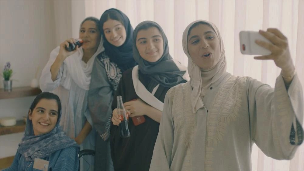Six Saudi Arabian girls are set to become the first all-female delegation to lead a national team out at the opening game of the World Cup in Russia. (Supplied: Coca-Cola)