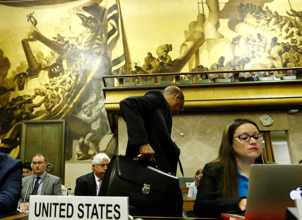 Photo showing the US Ambassador Robert Wood walks out in protest at Syria’s presidency of the Conference on Disarmament at the United Nations in Geneva, Switzerland May 29, 2018. (Reuters)