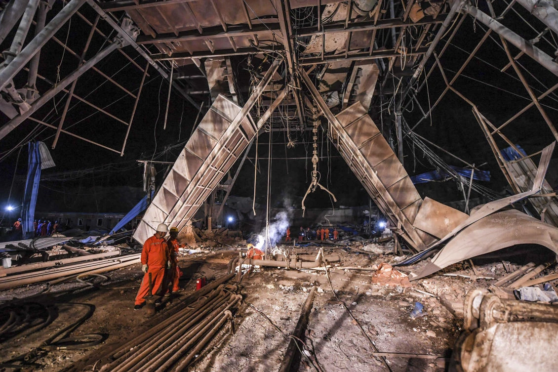 Rescuers work above ground at the site of a mine explosion in Benxi in northeastern China’s Liaoning province in this photo released by Xinhua News Agency. (Xinhua via AP)