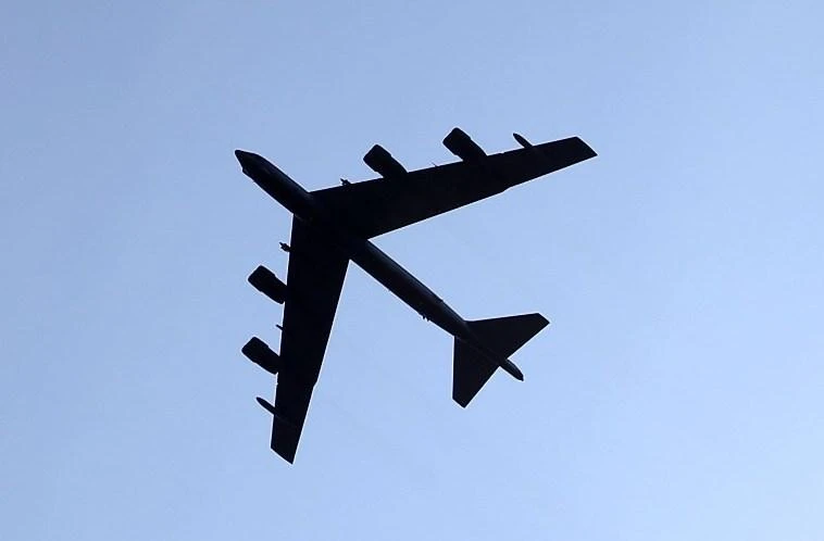 A pair of B-52 bombers, similar to one above, flew past a Chinese-held shoal in the South China Sea, which caused an uproar from Beijing. (AFP)
