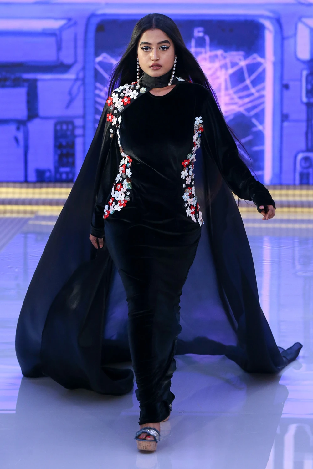 This velvet evening look is part of the sisters’ 2018 Cruise collection.