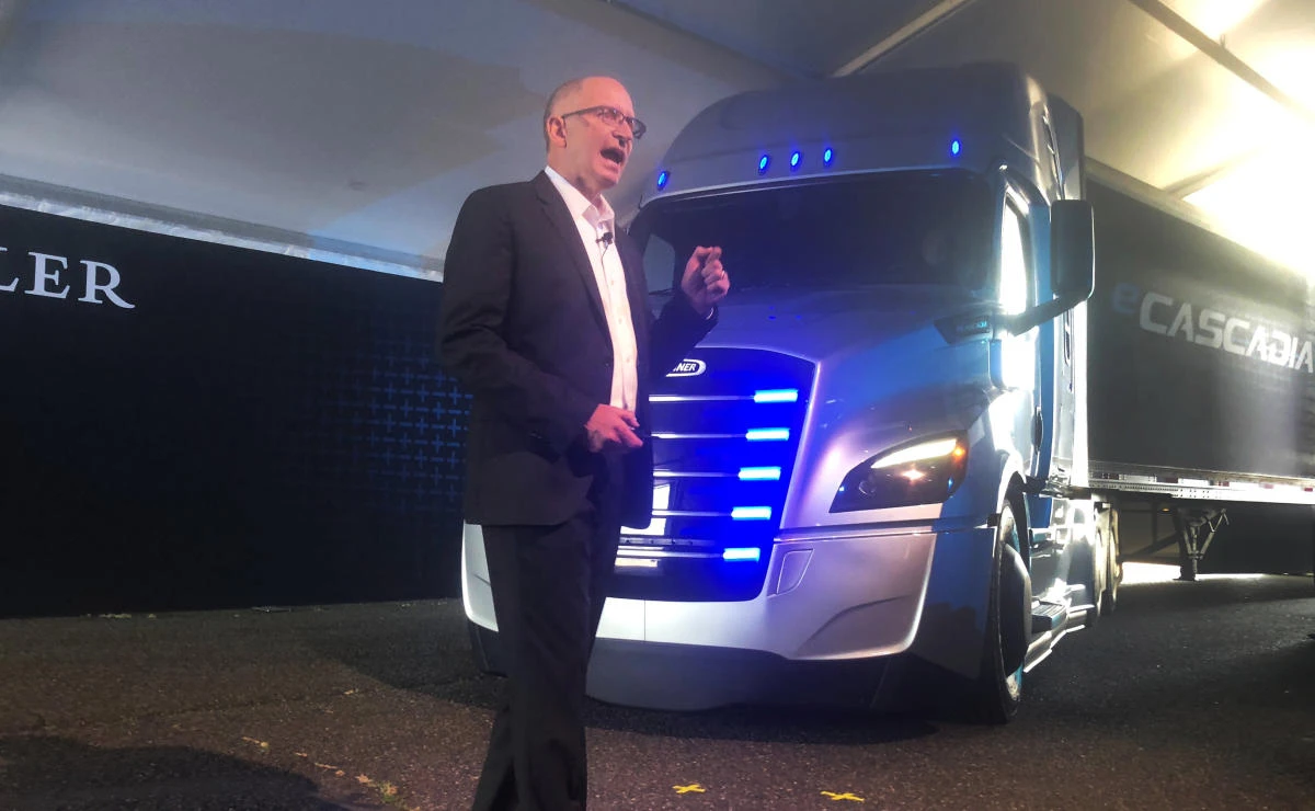 President and CEO of Daimler Trucks North America Roger Nielsen unveils the all-electric eCascadia big rig truck at an event at Portland International Raceway in Portland on Wednesday, June 6. (Reuters)