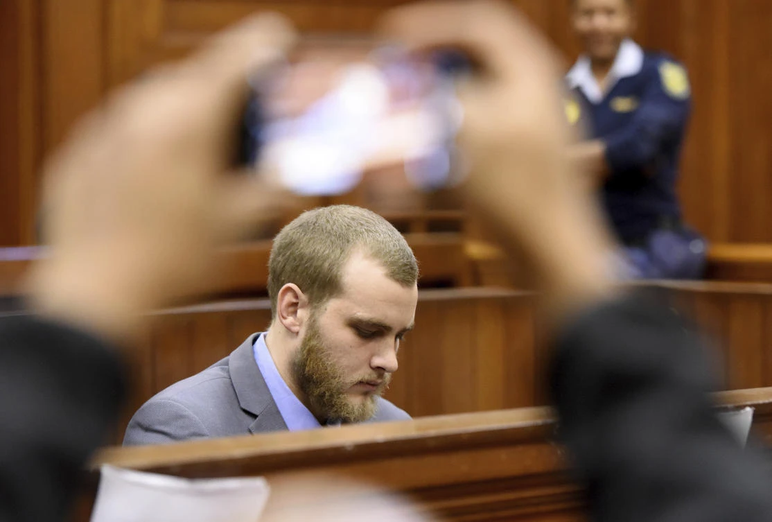 Henri van Breda was sentenced to three life sentences for the grisly killings of his parents and brother in 2015. (AP)