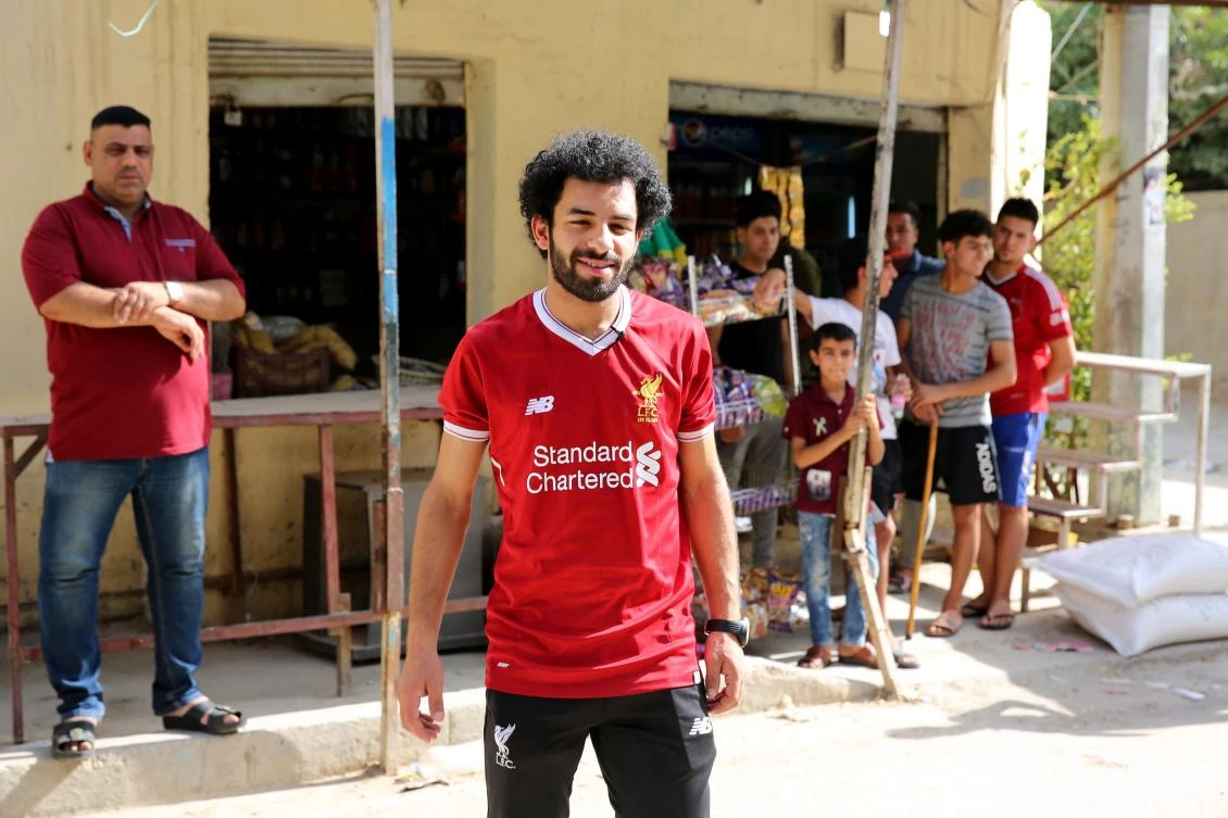 Iraqi footballer Hussein Ali, who plays for the Iraqi Al-Zawraa FC, is often mistaken for Liverpool’s Egyptian forward Mohamed Salah. (AFP)