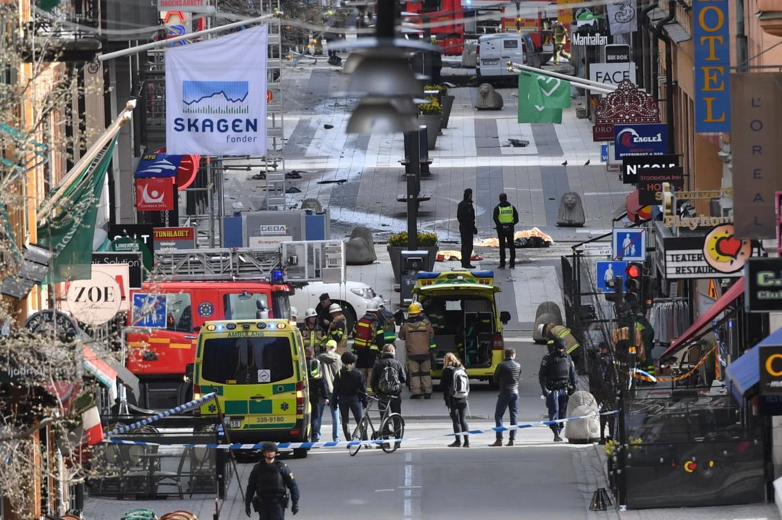 File photo showing emergency services at the scene of an attack on Drottninggatan street in central Stockholm, Sweden, where an Uzbek man killed five people and injured 14, on April 7, 2017. (AP)