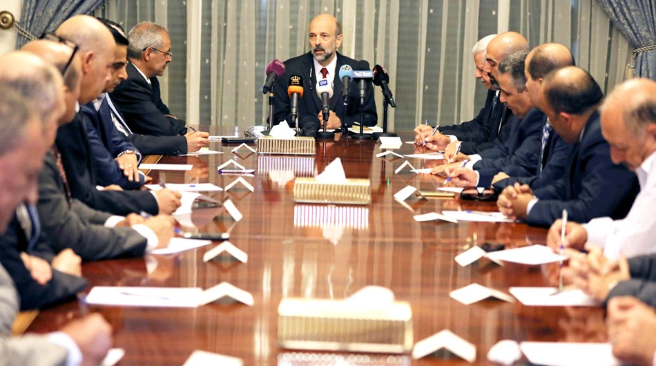 New Jordan PM to withdraw tax bill amid protests