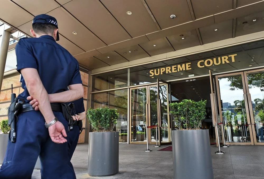 Singapore police say they arrested two South Korean journalists while investigating a report of trespassing in the residence of the North Korean ambassador. (AFP)