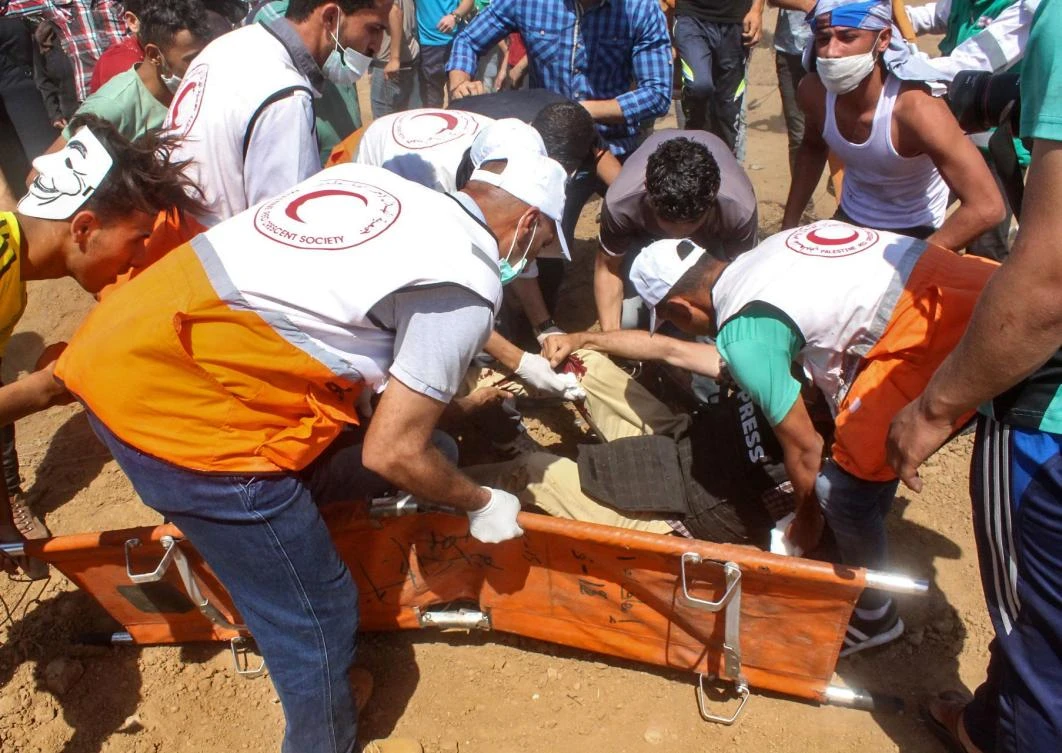 AFP photographer hit as Israel fires on Gaza protesters
