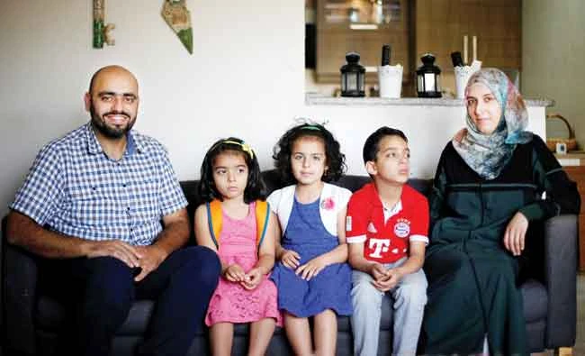 Ahmad Samara and Bayan Samara are struggling to keep their family afloat in Jordan’s sluggish economy. Reuters